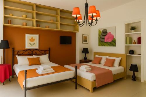 Ένα ή περισσότερα κρεβάτια σε δωμάτιο στο REALE COLOSSEO TREVI HOME - private garden