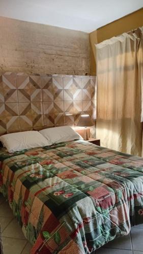 Ένα ή περισσότερα κρεβάτια σε δωμάτιο στο Casa Alquimia - La Casona