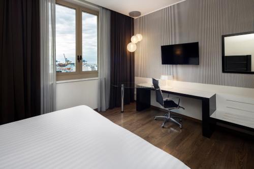 Postel nebo postele na pokoji v ubytování Holiday Inn Genoa City by IHG