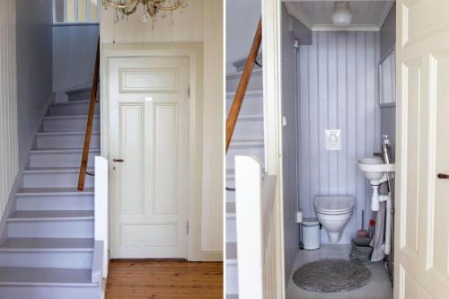 a bathroom with a white door and a toilet at STO754-Graeddoe-Maroe-1 in Gräsken