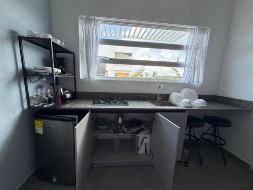 Η κουζίνα ή μικρή κουζίνα στο Atardeceres casa de playa