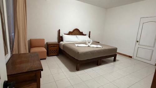 Postel nebo postele na pokoji v ubytování Casa Eva