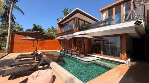 Πισίνα στο ή κοντά στο Villa Amrita - Oceanfront Villa with Private Beach