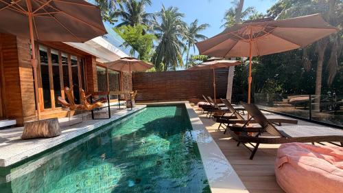 Πισίνα στο ή κοντά στο Villa Amrita - Oceanfront Villa with Private Beach