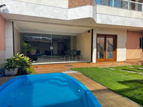 Πισίνα στο ή κοντά στο Casa temporada com piscina