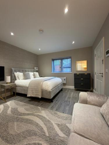 Ένα ή περισσότερα κρεβάτια σε δωμάτιο στο Premium Luxe Collection