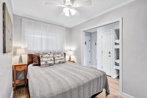 a bedroom with a bed and a ceiling fan at A145 HH Beach & Tennis Resort in Hilton Head Island