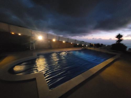 La alberca dentro o cerca de Sunset Paradise Villa with Heated Pool