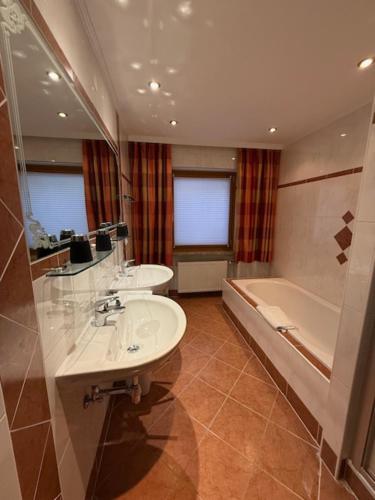 Ένα μπάνιο στο Sonnhang Apartment Unterkofler