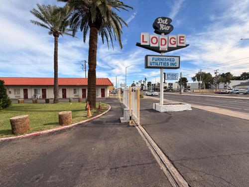 a sign for a jl joe franchise entrance at Del Rio Hotel O near Mesa Downtown in Mesa