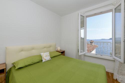 En eller flere senge i et værelse på MGH - Lake View Terrace Gardone