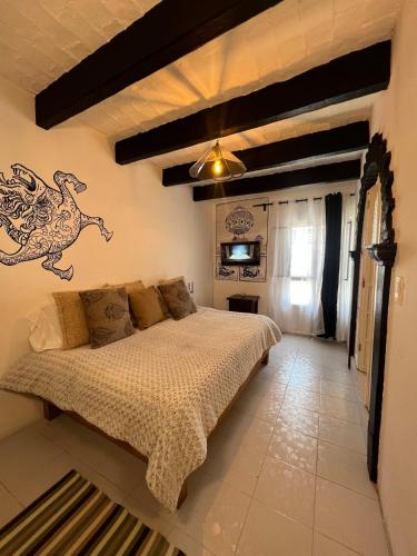 Ένα ή περισσότερα κρεβάτια σε δωμάτιο στο Casita hermosa En el centro