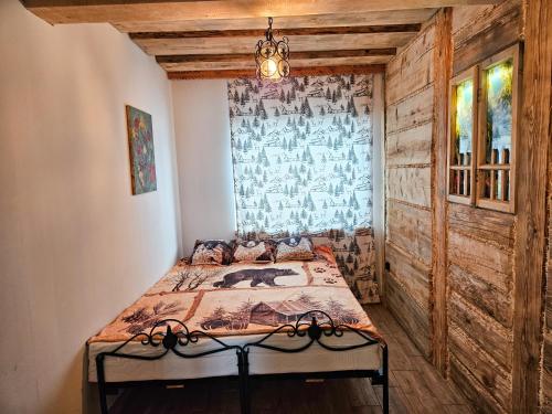 Ένα ή περισσότερα κρεβάτια σε δωμάτιο στο Apartament Koliba by Domki Tatry