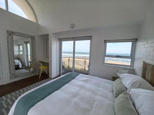 Ένα ή περισσότερα κρεβάτια σε δωμάτιο στο Xanadu