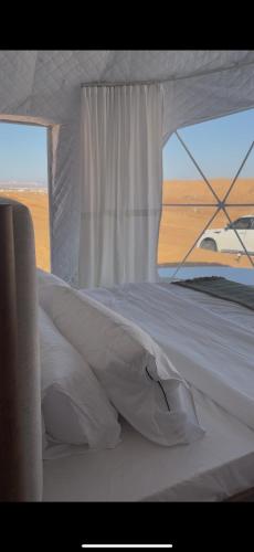 Ένα ή περισσότερα κρεβάτια σε δωμάτιο στο The mirage dome