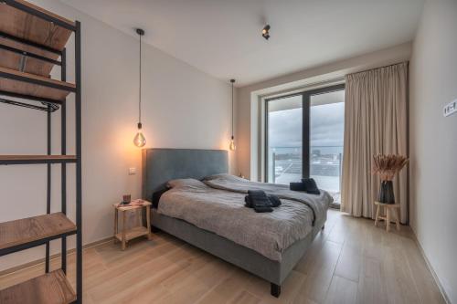 Postel nebo postele na pokoji v ubytování Apart 3 01