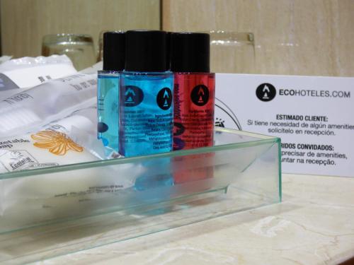 two bottles of sunscreen sitting on top of a table at Eco Via Lusitana in Madrid