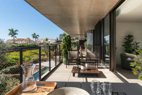an open balcony with a view of the ocean at Luxury Apartment at Savoy Monumentalis by An Island Apart in Funchal