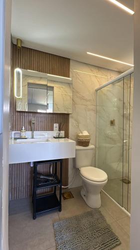 a bathroom with a sink and a toilet at Boutique House - Ilha Grande in Abraão