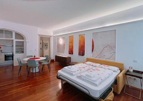 Ένα ή περισσότερα κρεβάτια σε δωμάτιο στο Guesthouse Bauzanum Streiter