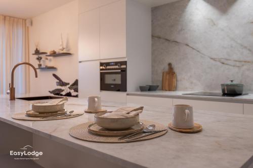 Køkken eller tekøkken på FORTESSE - Luxury apartment near the sea with parking