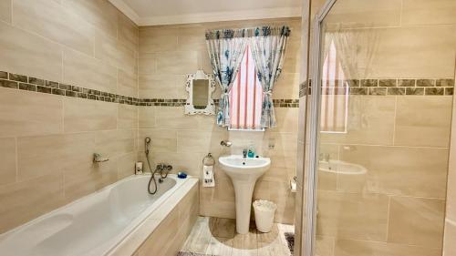 Et badeværelse på Greenshields Park Guesthouse