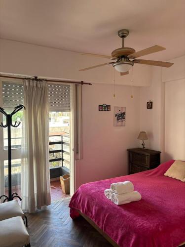 Ένα ή περισσότερα κρεβάτια σε δωμάτιο στο Apart familiar - pasos de Oroño - Cerca de todo!