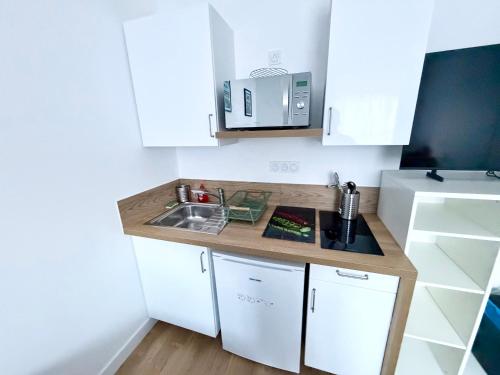 Küche/Küchenzeile in der Unterkunft Appartements meublés Brest centre