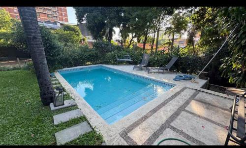 Φωτογραφία από το άλμπουμ του Habitación para 4 en el centro de Asunción con piscina e inmenso jardín στην Ασουνσιόν