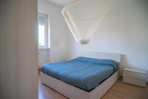 Postel nebo postele na pokoji v ubytování P&P Bergamo Apartment