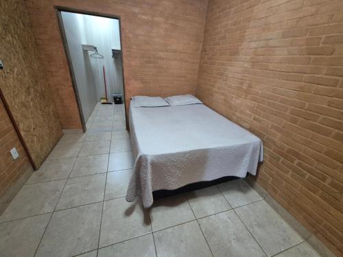 En eller flere senge i et værelse på Suite 2 ambientes AR na área central para 2 ou 3 pessoas-202A