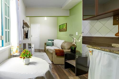 Giường trong phòng chung tại Casa Aconchegante