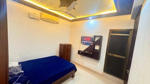 Ένα ή περισσότερα κρεβάτια σε δωμάτιο στο HOTEl MJ INN