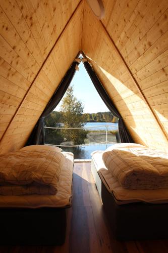 Ένα ή περισσότερα κρεβάτια σε δωμάτιο στο Åsele Camping and Holliday homes