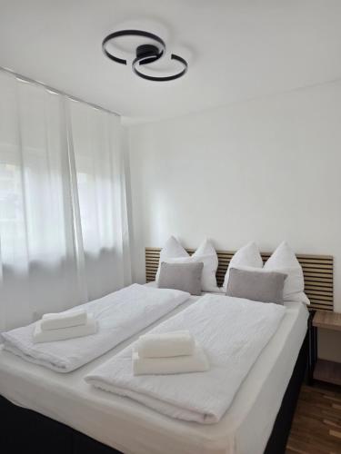 Ένα ή περισσότερα κρεβάτια σε δωμάτιο στο Zentrale Wohnung, nähe Innenstadt