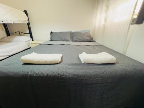 En eller flere senge i et værelse på Apartment in Nueva Córdoba