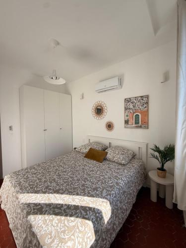 Ένα ή περισσότερα κρεβάτια σε δωμάτιο στο Angèle