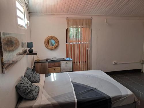 Ένα ή περισσότερα κρεβάτια σε δωμάτιο στο Maison