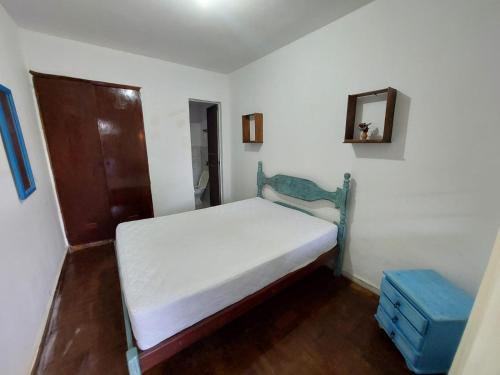 Кровать или кровати в номере Hostel Mariah ,comidaria e lanchonete