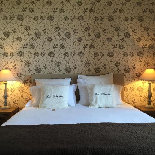 Katil atau katil-katil dalam bilik di Le Manoir de Bénédicte B&B