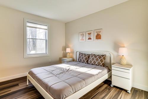 a bedroom with a bed and a window at Pet-Friendly Group Getaway 12 Mi to Camelback Mtn! in Mountainhome