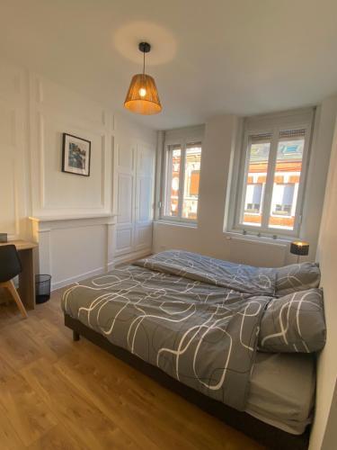 Ein Bett oder Betten in einem Zimmer der Unterkunft la maison des copains, garage et wifi