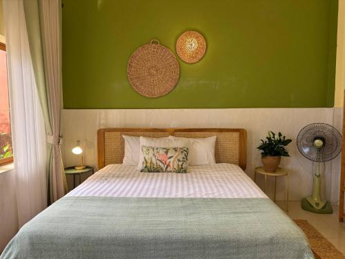 Кровать или кровати в номере Serene City Hideaway in Phnom Penhs Heart