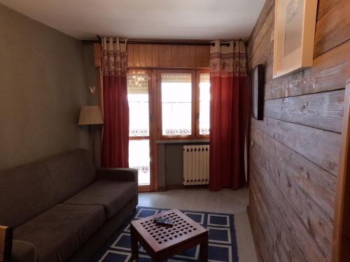 Posezení v ubytování Stella Alpina Apartment - Prato nevoso