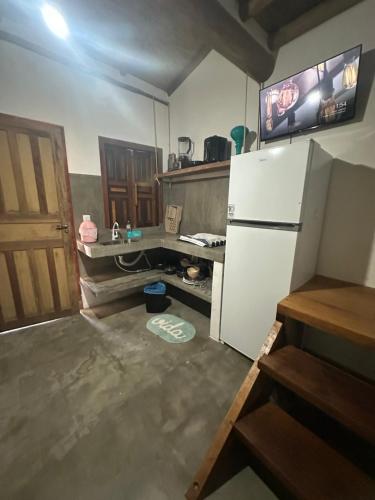 Cuisine ou kitchenette dans l'établissement Vila Uryah