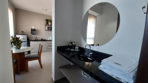 Una cama o camas en una habitación de Studio Garden - ideal para relaxar ou trabalhar