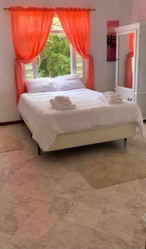 Katil atau katil-katil dalam bilik di Oceanfront Hideaway mainfloor
