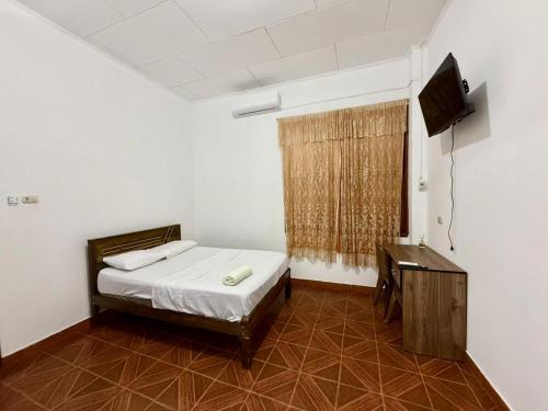 Ένα ή περισσότερα κρεβάτια σε δωμάτιο στο Estancia Charito