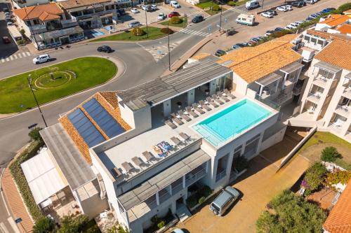 Πισίνα στο ή κοντά στο ISA - Hotel with panoramic swimming pool in Porto San Paolo just 850 mt from the sea