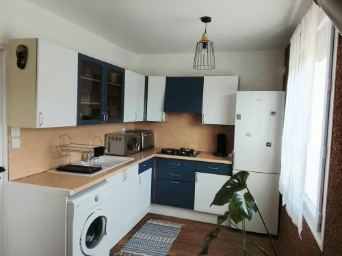 Η κουζίνα ή μικρή κουζίνα στο Grand Duplex, proche de la Dordogne